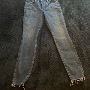 Good American Dark Blue Skinny Jeans with Distressed Hem